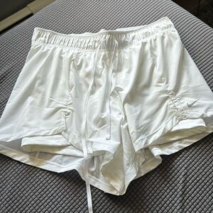 NIKE WOMEN'S TEAM DRI-FIT FLEX 2-1 SHORT